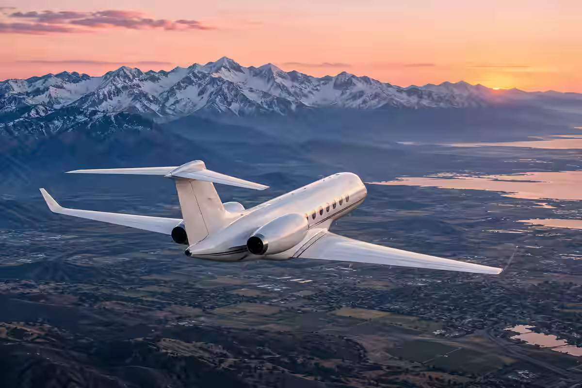 AI-generated illustration of a private jet above a mountain valley at dawn, inspired by Salt Lake City.